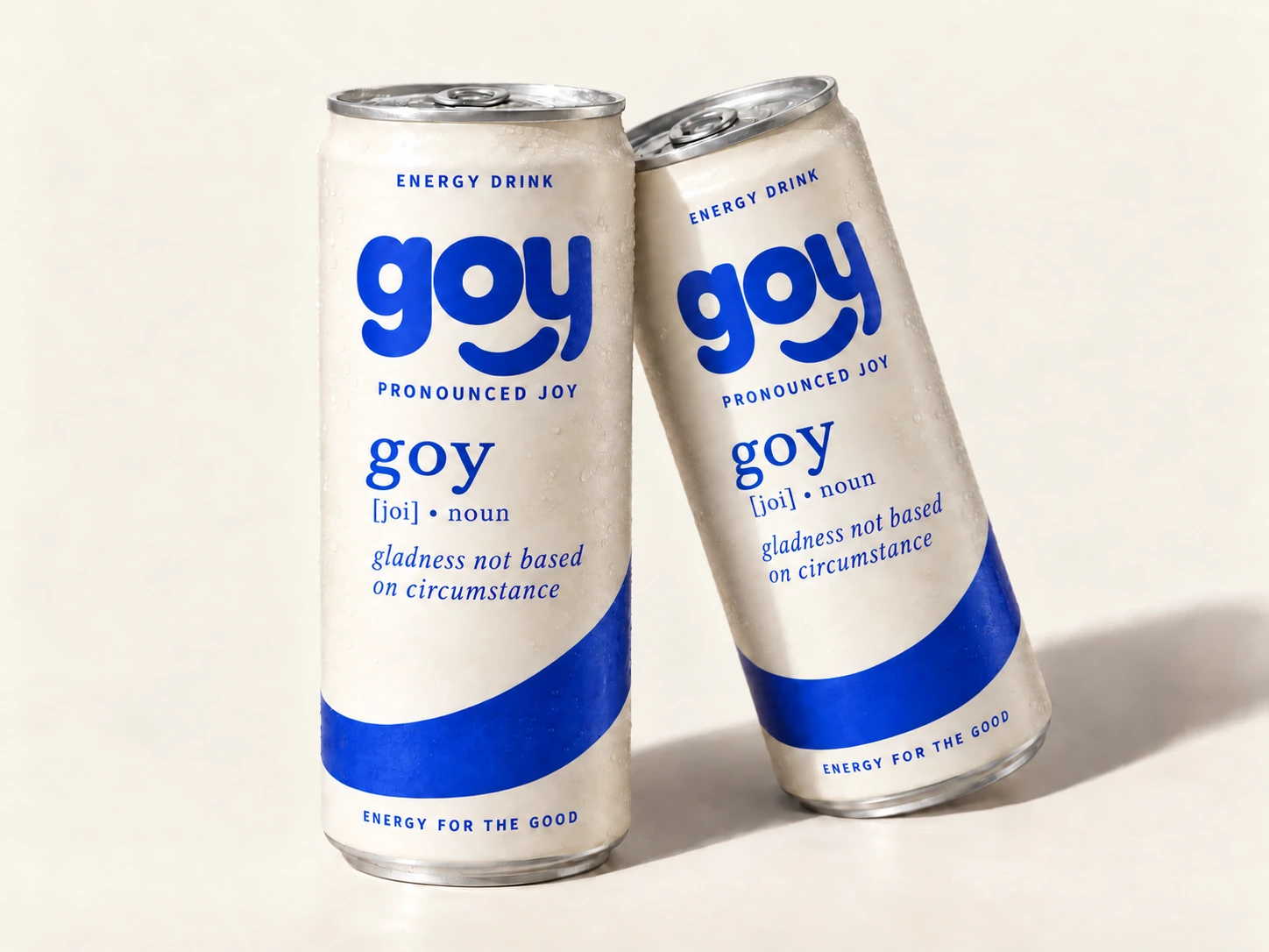 Cream GOY energy drink cans showing pronounced Joy and the dictionary definition